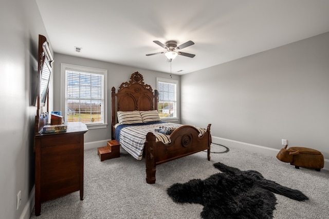 bedroom featuring ceiling fan and light colored carpet