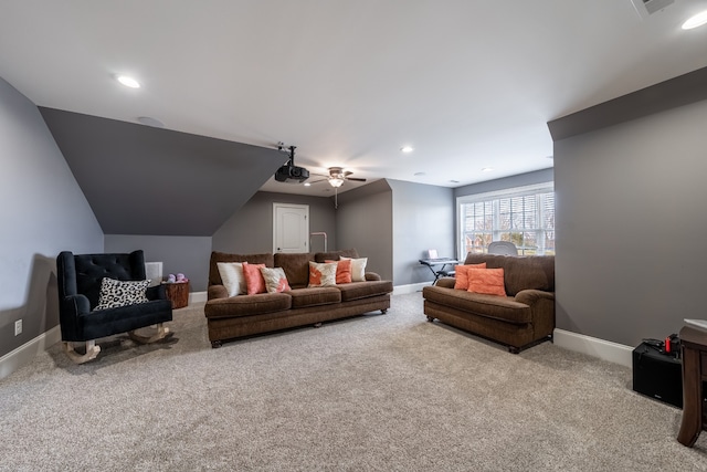 carpeted living room featuring ceiling fan