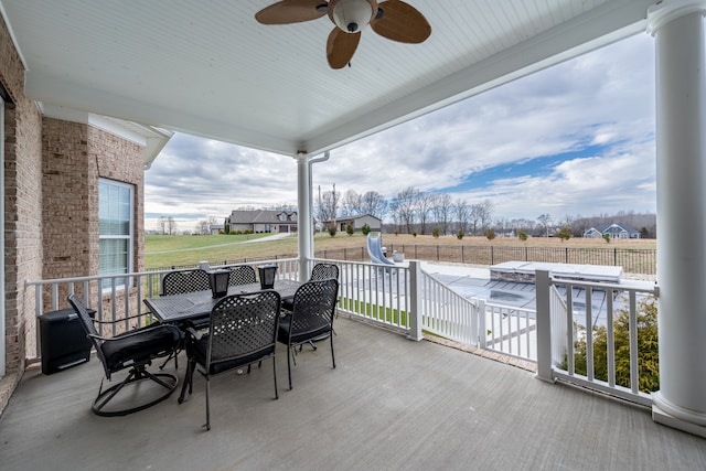 view of patio featuring ceiling fan