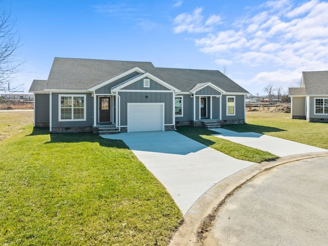 view of front facade featuring a front lawn and a garage