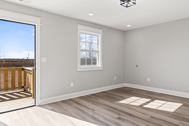 empty room with dark hardwood / wood-style floors