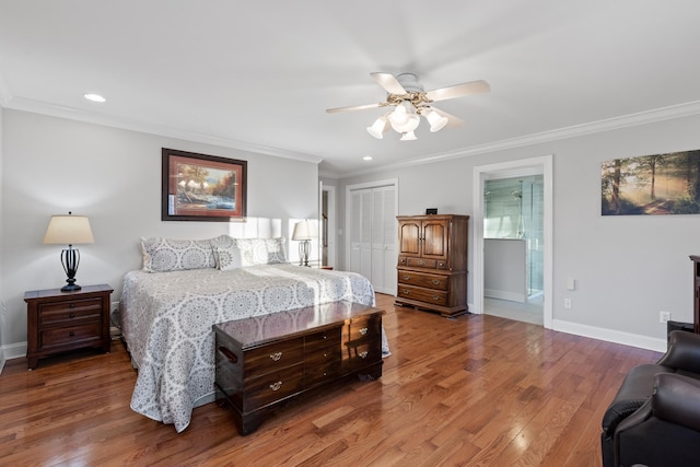 bedroom featuring ceiling fan, a closet, dark hardwood / wood-style floors, and ornamental molding