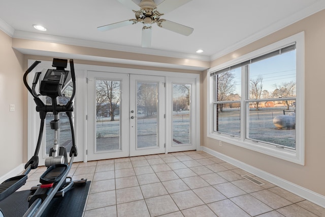 workout room featuring ceiling fan, crown molding, french doors, and a healthy amount of sunlight