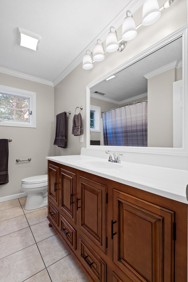 bathroom featuring ornamental molding, tile patterned flooring, vanity, and toilet