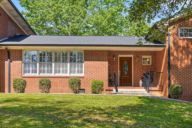 view of front of home with a front yard