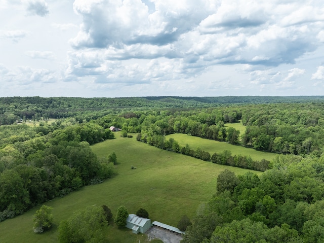 birds eye view of property with a rural view