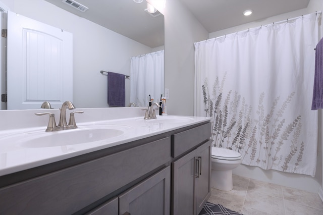 full bathroom with toilet, shower / tub combo with curtain, tile floors, and dual vanity