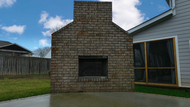 view of property exterior featuring a patio