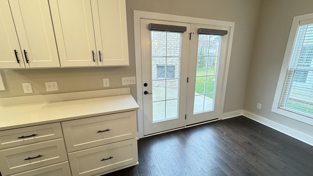 doorway to outside featuring dark hardwood / wood-style floors