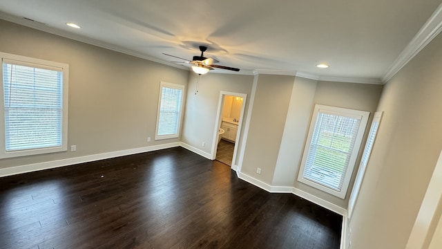 unfurnished living room with ceiling fan, dark wood-type flooring, and a wealth of natural light