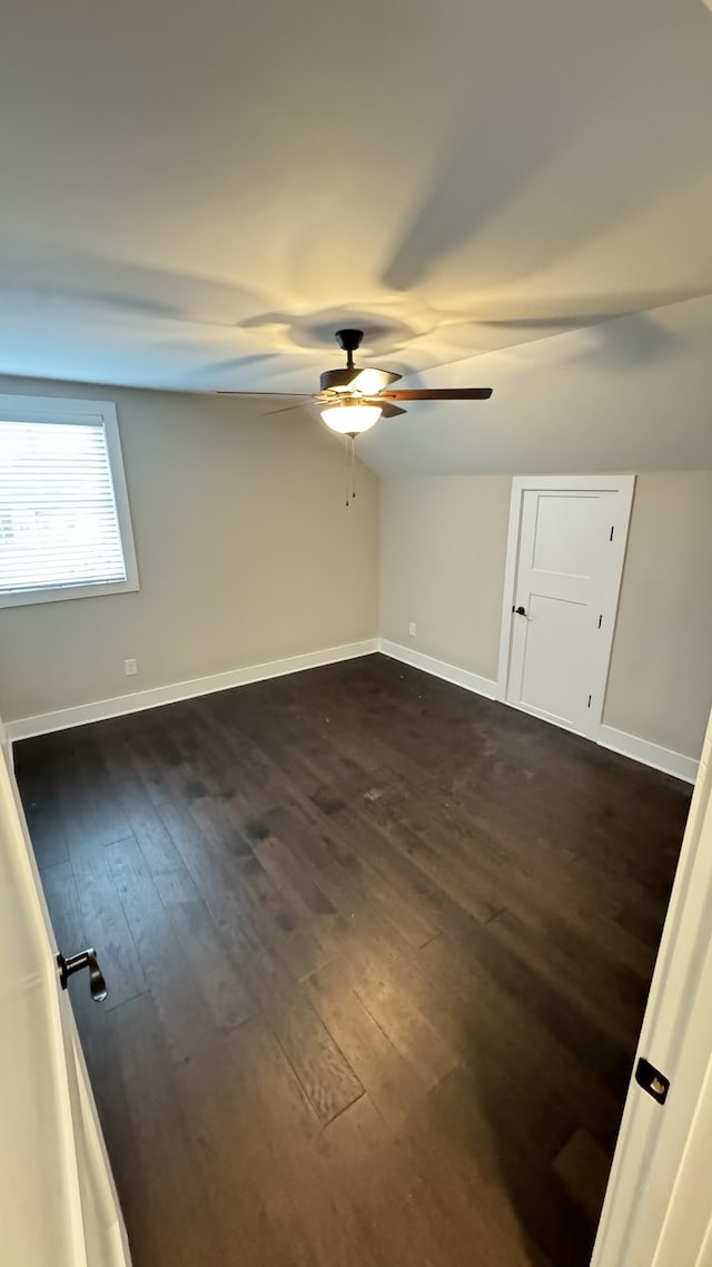 interior space featuring dark hardwood / wood-style floors and ceiling fan