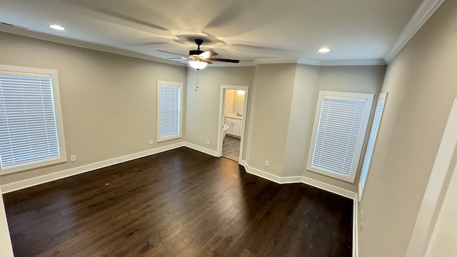 unfurnished bedroom with ornamental molding, ceiling fan, and dark wood-type flooring