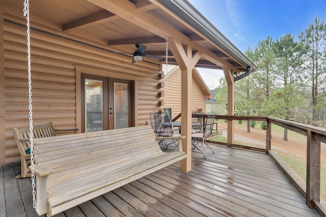 wooden terrace featuring french doors