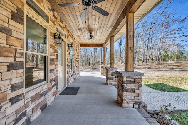 view of patio featuring ceiling fan