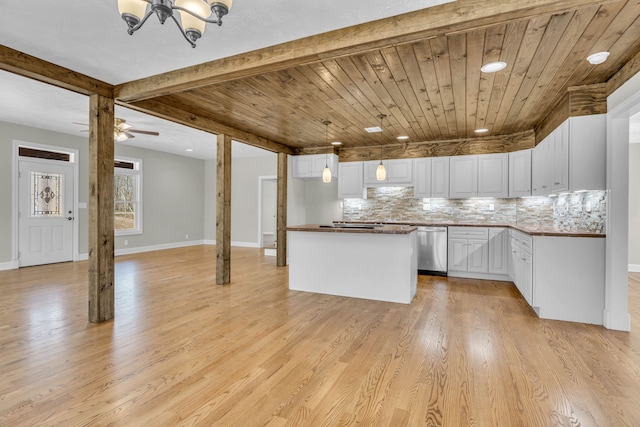 kitchen with hanging light fixtures, light hardwood / wood-style floors, dishwasher, ceiling fan with notable chandelier, and white cabinets