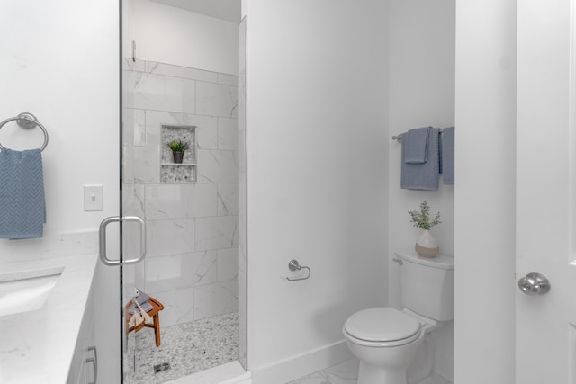 bathroom featuring an enclosed shower, vanity, tile floors, and toilet