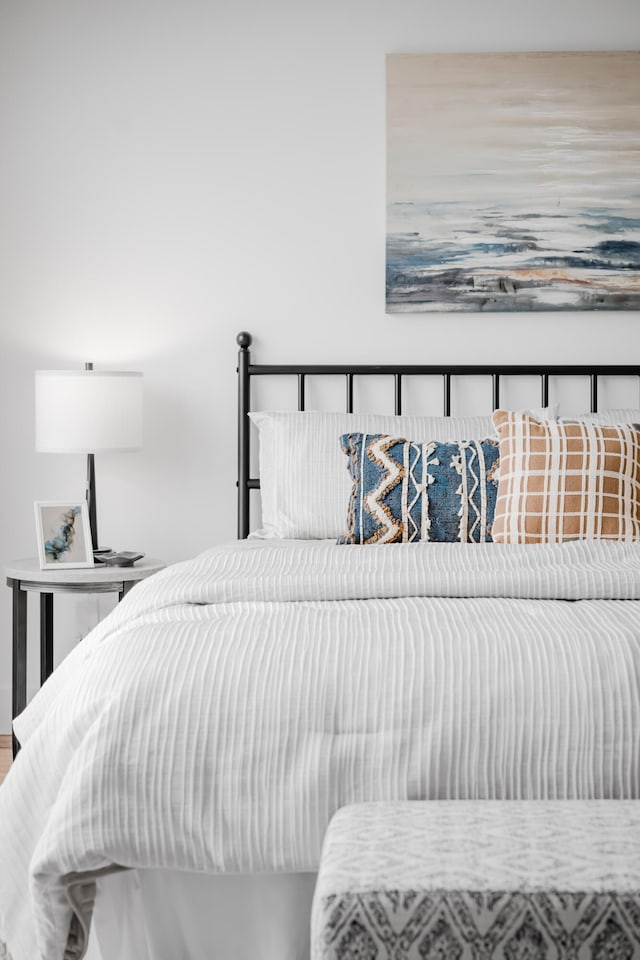 bedroom featuring hardwood / wood-style flooring