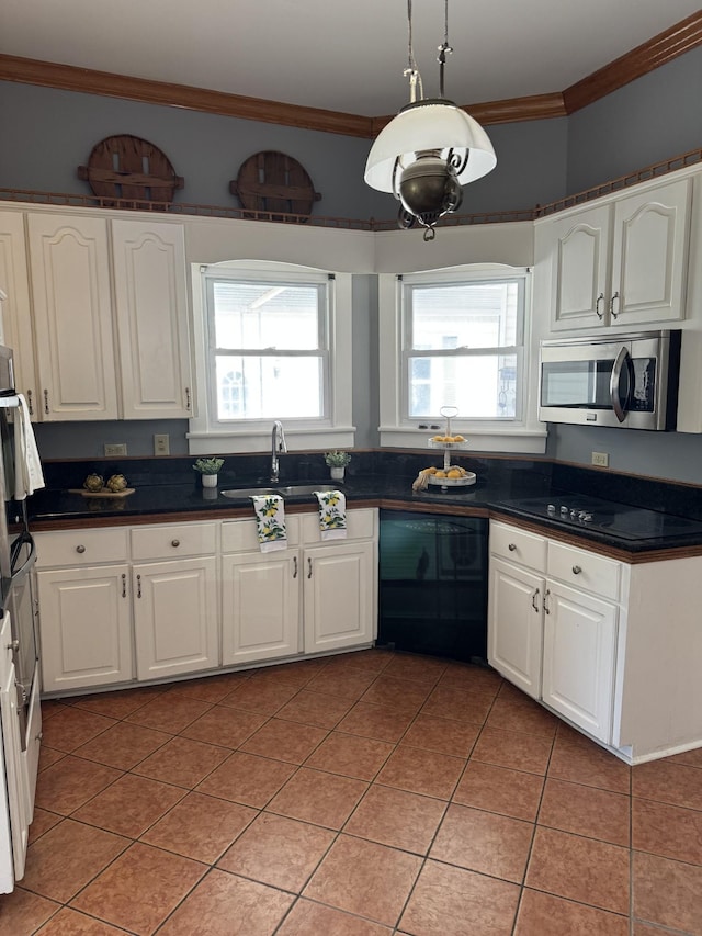 kitchen featuring black appliances, white cabinetry, ornamental molding, and tile patterned floors