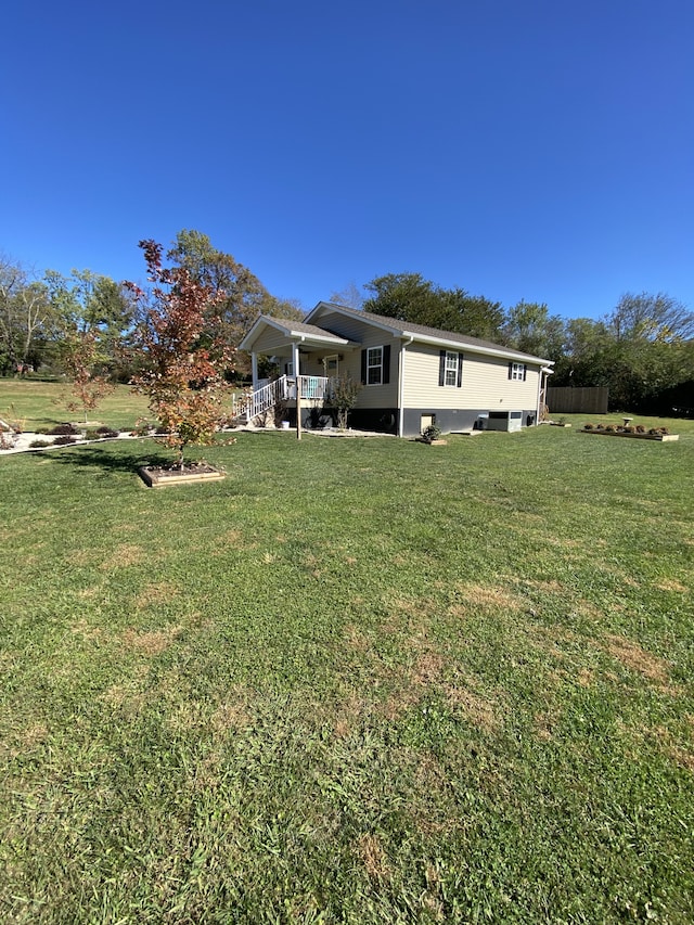 view of yard featuring a porch