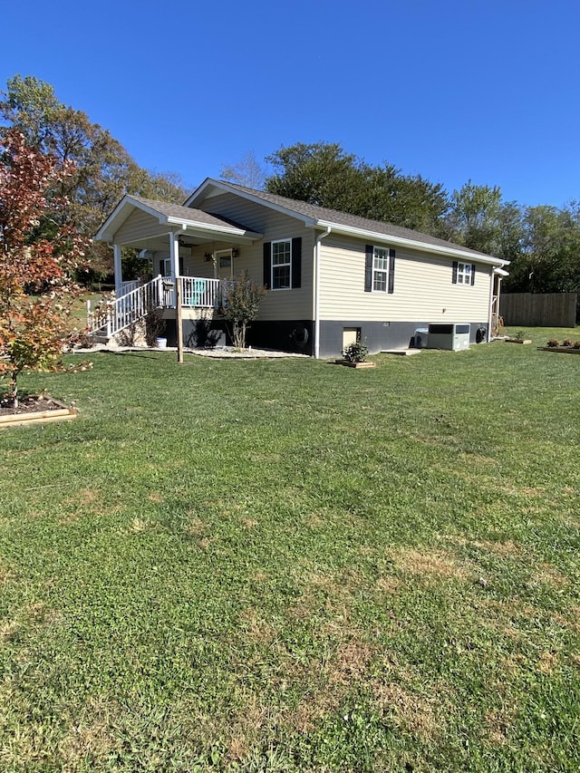 exterior space featuring a yard and a porch
