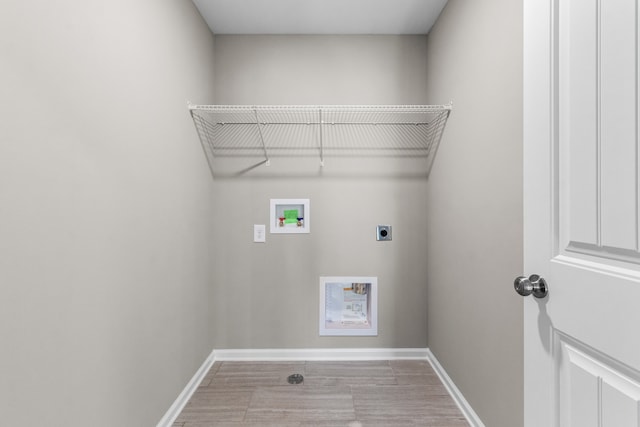 laundry area with hookup for an electric dryer and hookup for a washing machine