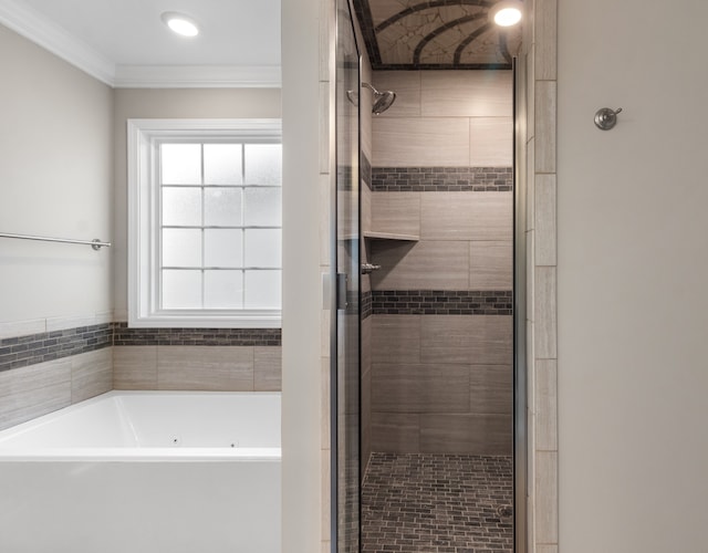 bathroom featuring crown molding and independent shower and bath