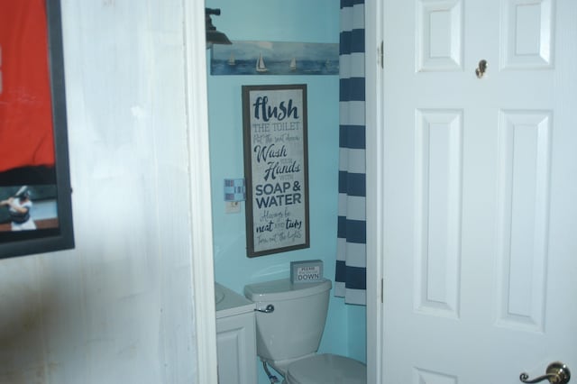 bathroom with vanity and toilet