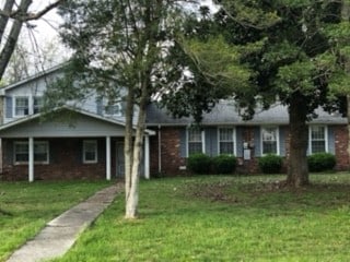 view of front of home with a front yard