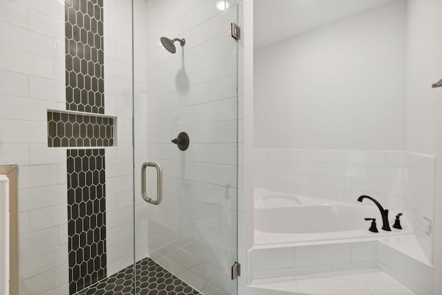 bathroom with independent shower and bath