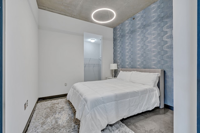 bedroom with concrete flooring