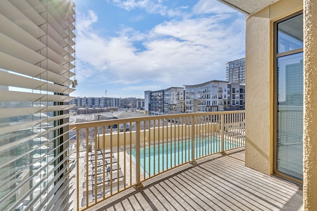 balcony with a community pool