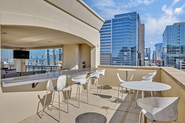 view of patio / terrace with a balcony