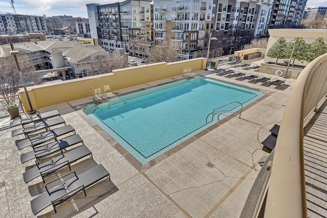 view of pool featuring a patio area