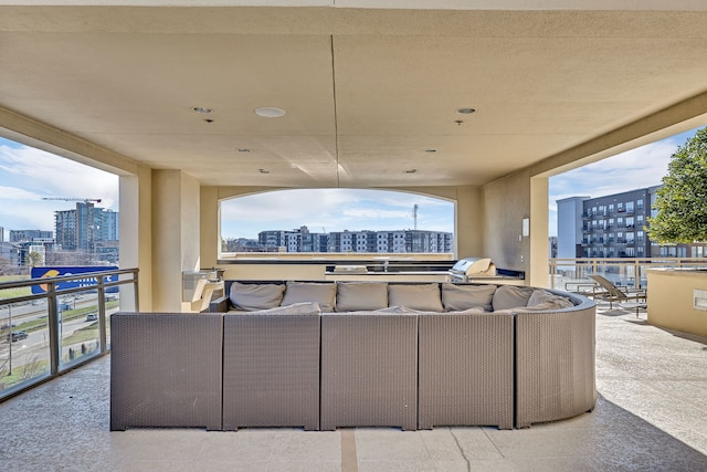 exterior space with a balcony and outdoor lounge area