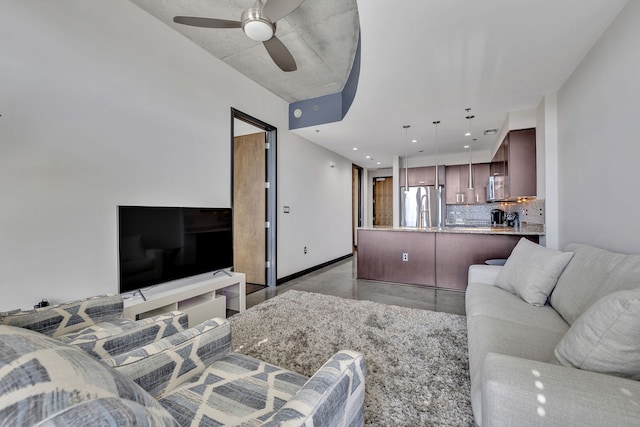 living room featuring ceiling fan