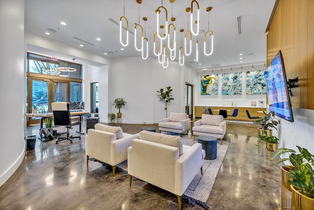 living room with a notable chandelier