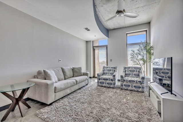 living room featuring ceiling fan