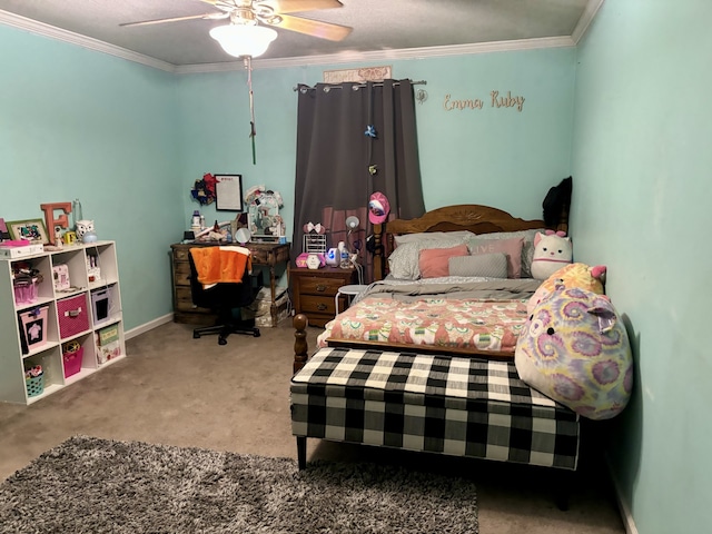 carpeted bedroom featuring ceiling fan and ornamental molding