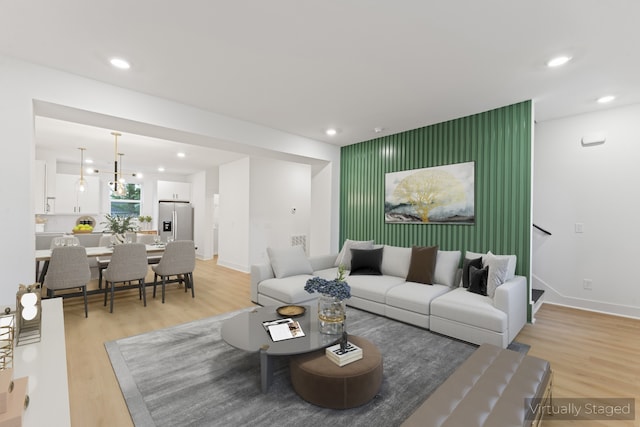 living room with light hardwood / wood-style floors