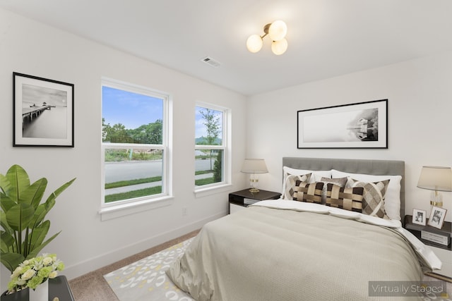 bedroom featuring carpet