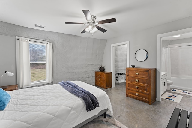 bedroom with ceiling fan and ensuite bathroom