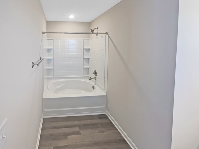 bathroom featuring shower / tub combination and wood-type flooring