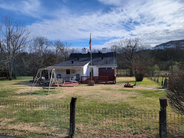 view of yard featuring a rural view and a wooden deck