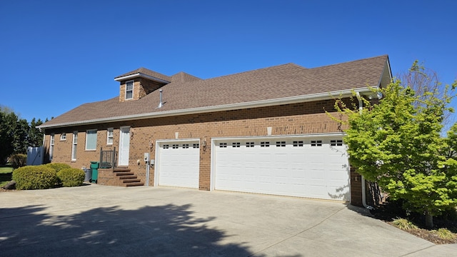 view of property exterior featuring a garage