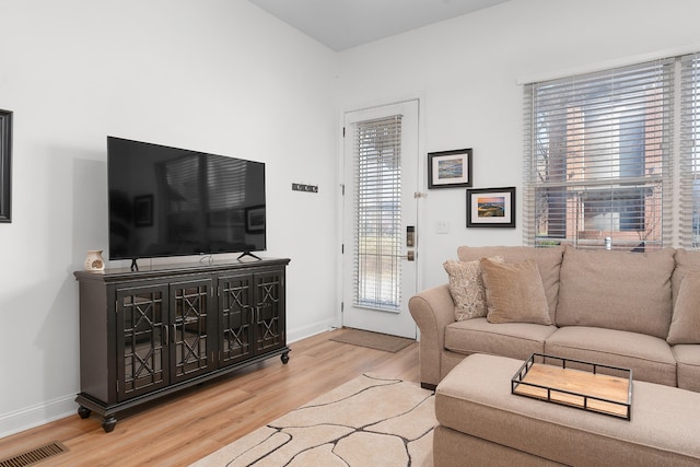 living room featuring light wood-type flooring