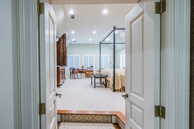 corridor with carpet flooring