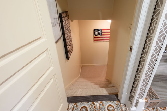 stairs with light colored carpet