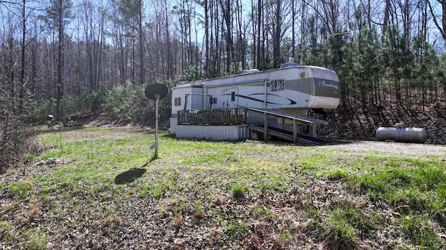 view of yard with a deck