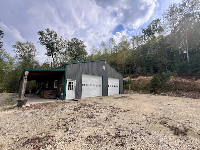 garage with a carport