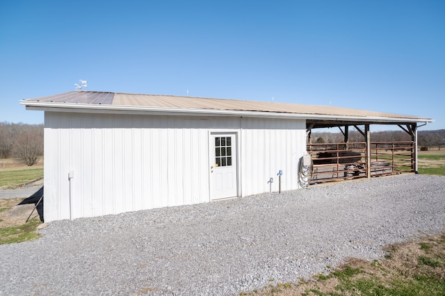 view of horse barn featuring an outdoor structure